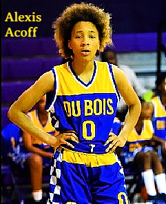 Image of girls basketball player ALexis Acoff, W.E>B. DuBois High School, Tennessee, standing in blue uniform with yellow lettering, hands on hips, number zero.