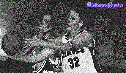 Image of girls basketball player Adrienne Squire, Indian Creek High School (Indiana) going up for a right-handed underhand layup in her white #32 BRAVES uniform. From the Daily Journal, Franklin, Indiana, November 21, 2003. Photo by Frank T. Mendez..