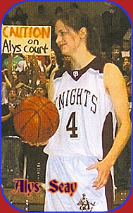 Image of North Dakota girls basketball player, Alys Seay, on January 5, 2006, being presented with game ball after scoring 49 points in game. In white #4 KNIGHTS uniform.