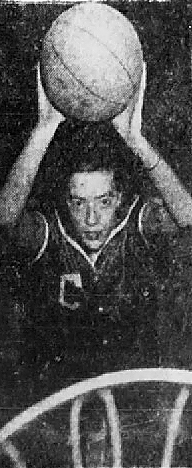 Image taken from above basket of Anna Belle Cole, girls basketball player for Clayton High School, North CArolina, with ball about to throw into basket. From The News and Observer, Raleigh, North Carolina, February 6, 1952.