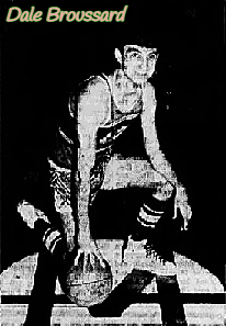 Image of Louisiana boys basketball player Dale Broussard, Maurice High School, shown kneeling at center court with basketball in #13 uniform. From the Abbeville Meridional, Abbeville, Louisiana, March 13, 1969.