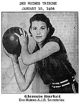 Image of Glennis Burket, holding basketball to her right with both hands, posing, as if to pass. On the Des MoinesAmerican Institute of Business School basketball team. From the Des Moines Tribune, January 10, 1936.