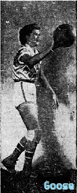 Image of Goose Garroutte, with basketball in right hand held out towards the right. From the Clarion-Ledger, JAckson, Mississippi, February 4, 1957.