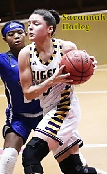 Image of Mississippi girls basketball player Savannah Hailey of the Centreville Academy High School team, shown driving to the basket with ball up by her left shoulder.