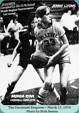 Game acttion from 3/11/1975 gamme between the McDowell Lady Dare Devils and the Campbell County Camelettes, won by Campbell, 60 to 55. Image shows Jennifer (Jenny) lyons, #33, with ball looking to her left (our right) to pass the ball, guarded fro behind by Brenda Ryan, #10 of the Camelettes. From The Cincinnati Enquirer, March 12, 1975. Photo by Dick Swain.