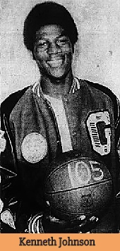 Picture of boys basketball player, Kenneth Johnson, Grandfield High School (Oklahoma), in team jacket, holding basketball with 105 written in white on it. From The Herald-Palladium, St. Joseph, Michigan, JAnuary 11, 1979.