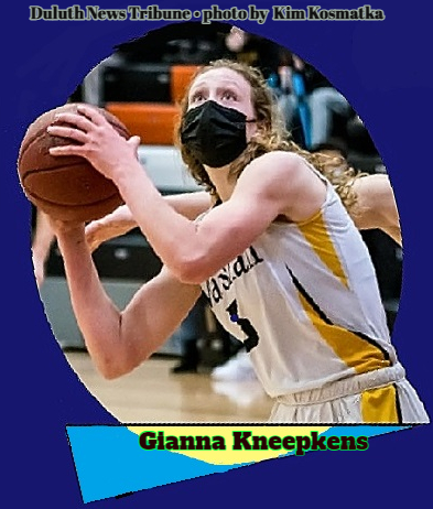 Piccture of Gianna Kneepkens, girls basketball player for Marshall High School, Duluth, Minnesota, shown looking to shoot the basketball, with mask on, for two of her record 67 points. From the March 30, 2021 Duluth Tribune, photograph by Kim Kosmatka.