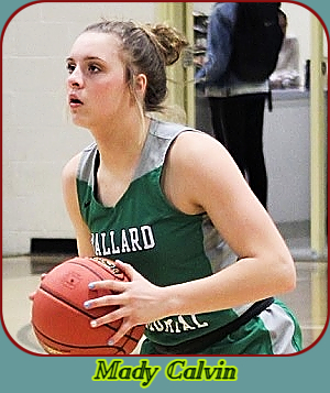 Photo of girls basketball player, Mady (Madison) Calvin, Ballard Memorial High School (Kentucky. Shown in green Lady Bomber uniform about to shoot a foul shot to our left.
