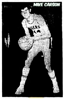 Image of West Virginian boys basketball player, Mike Carson, Sisterville High School, posing  with bal in white TIGERS #14 uniform. From the Lubbock Avalanche-Journal, Lubbock, Texas, February 3, 1969.