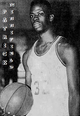 Image of Patrick Minnifield, Shongaloo High School (Louisina) boys basketball player, #32, holding basketball with right arm. From the Shreveport Journal, Shreveport, La., January 5, 1991. Photo by Ed Barham