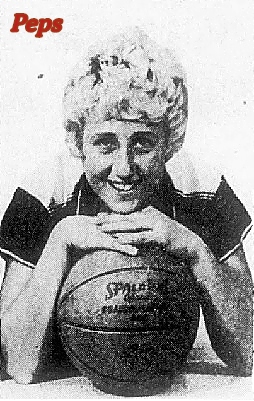 Portrait of ELvera (Peps) Neuman, woman basketball player, with both arms on ball in front of her face. From The Daily register, Red Bank, New Jersey, February 8, 1973