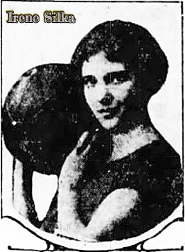 Portrait with left shoulder in foreground, holding basketball up near face, of Irene Silka, girls basketball player for Maynard High School, Iowa. From The Des Moines Register, March 23, 1926.