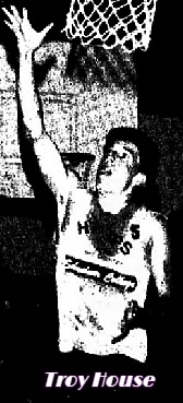 Image of boys basketball player Troy House, Ingram Tom Moore High School (Texas), show up near basket making a lay-up. From The Kerrville Daily Times, Kerrville, TExas, February 22, 1989.