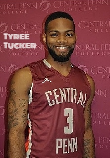 Basketball player, Tyree Tucker, Central Penn College, posing in red Central Penn #3 uniform.
