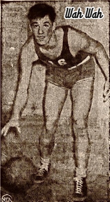 Image of boys basketball player, Walter (Wah Wah) Jones, Harlan High (Kentucky), who scored 68 points in 1943. Shown posing crouched and dribbling in uniform #16. From the Muncie Evening Press, Muncie, INdiana, March 15, 1945.