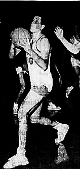 Basketball player, Gerald Woodard going up for a lay-up in the January 22, 1966 White v Blue game at the Alexandria Coliseum, just opened, Louisiana.