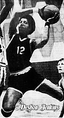 Image of Louisiana boys basketball player Deshon Jenkins, Jena High School, shown in dark uniform #12, up in the air, legs bent, with ball about to shoot. From The Town Talk, Alexandria, Louisiana, February 10, 1982.