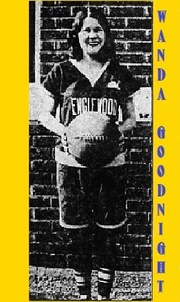 Posed image of a smiling Wanda Goodnight, in her ENglewood High School basketball uniform, holdinga  basketball in front of her, seam showing in front. From The Wichita Eagle, Wichita, Kansas, March 2, 1929, a day after she scored 116 points in ne basketball game.