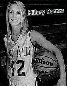 Alabama high school girl layer, Hillary Barnes, #12, St. James High from Montgomery, smiling at camera with ball under elbow helf against side on left side. From the Montgomery Advertiser, Montgomery, Alabama. April 11, 2004. Photographer Karen S. Doerr.