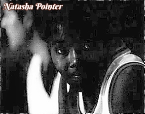 Image of Illinois girls basketball player Natasha Pointer, Young High School, Chicago, looking at camera, close-up, from side, fromthe Chicago Tribune, Chicago, Ill., JAnuary 10, 1997. Photo by Nuccio DiNuzzo.