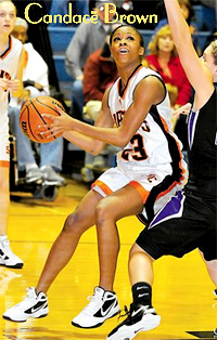Picture of Candace Brown, Summers County High (West Virginia) basketball player, in action shot trying to shoot while guarded.