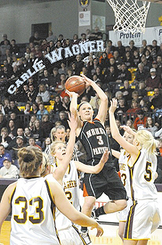 Carlie Wagner, shooting aty the basket for the NRHEG Panthers.
