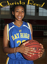 Image of Christa Reed, Bay High, Mississppi, basketball player, holding basketball in her yellow on blue uniform.
