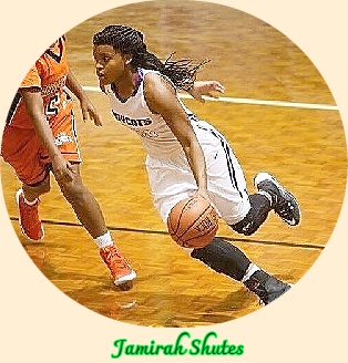 Image of Tennessee girls basketball player, Jamirah Shutes, Haywood High, driving with basketball.