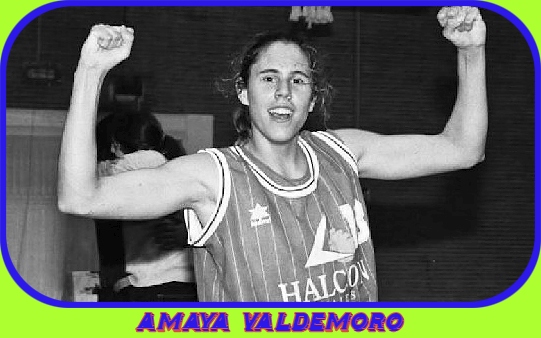Image of Amaya Valdemoro, Spanish women's basketball player, in Halcon uniform with fists in the air.